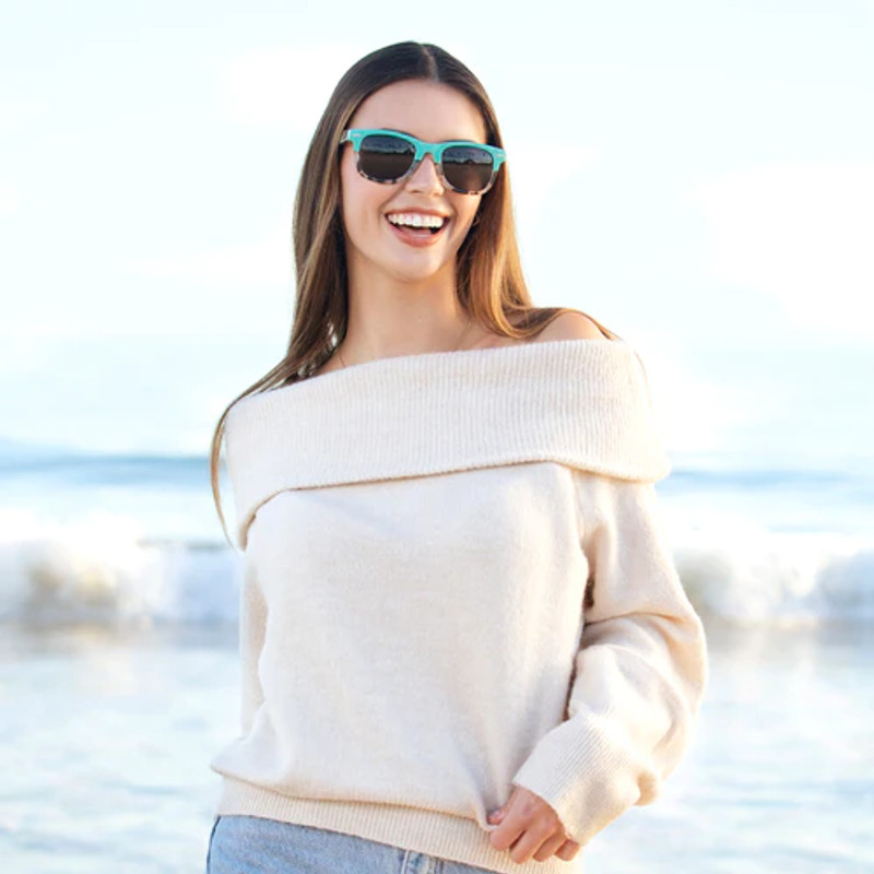 woman wearing sunglasses at beach