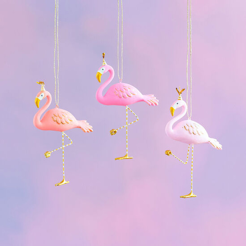 pink flamingo ornaments in party hats